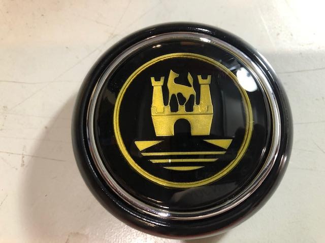 Split Screen Black Horn Button with Gold crest